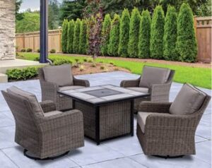 4 cushioned wicker chairs and a square fire pit conversion table